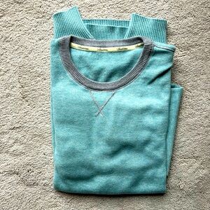 Stenströms light blue/gray trim pullover sweater.
